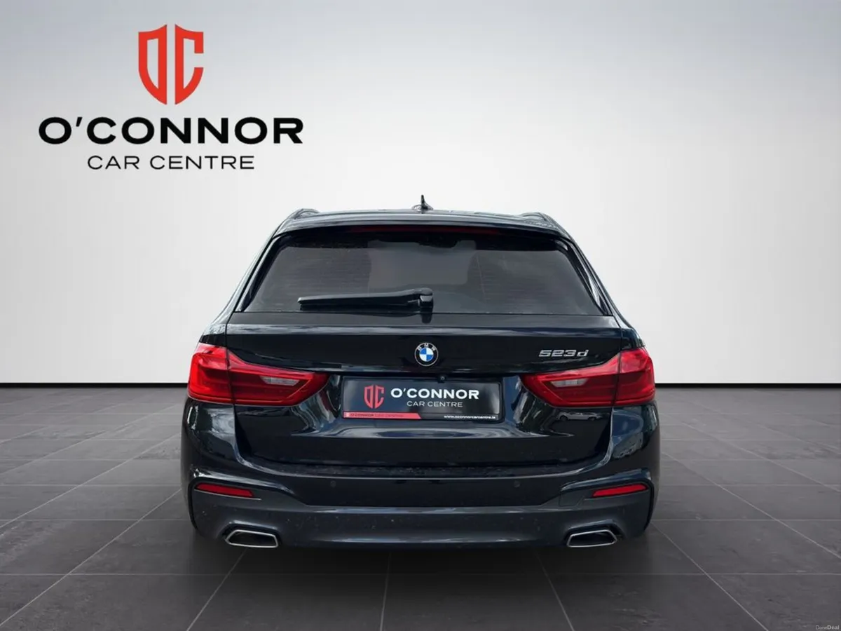 BMW 5-Series Looks like the boss's car. until you - Image 5
