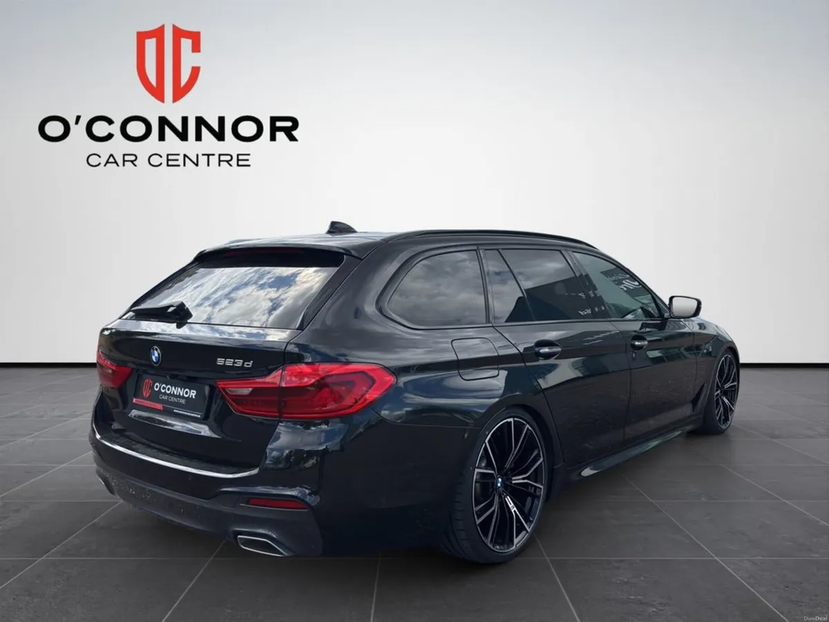 BMW 5-Series Looks like the boss's car. until you - Image 6