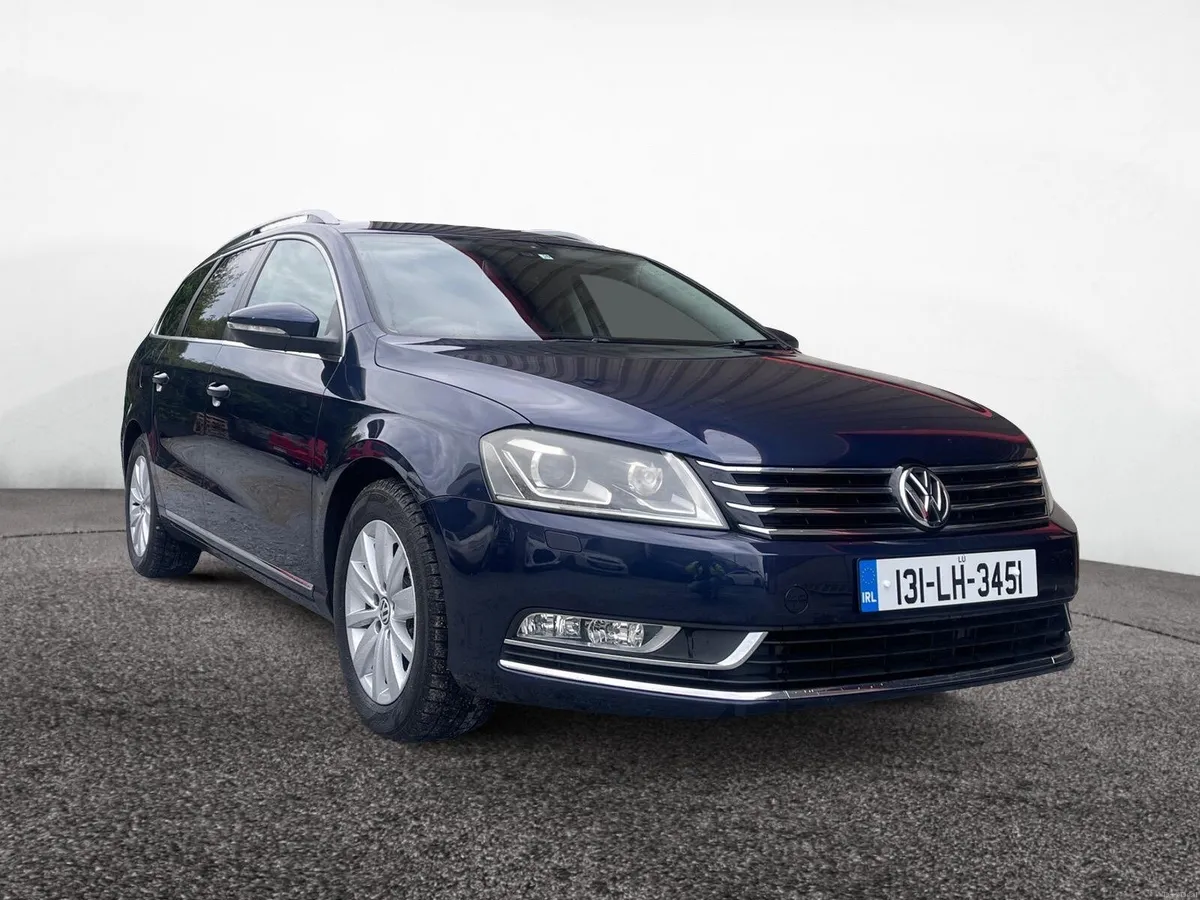 2013 Blue VW Passat Estate - Image 1