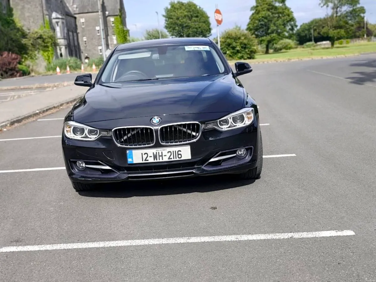 BMW 320i 2012 - Image 1