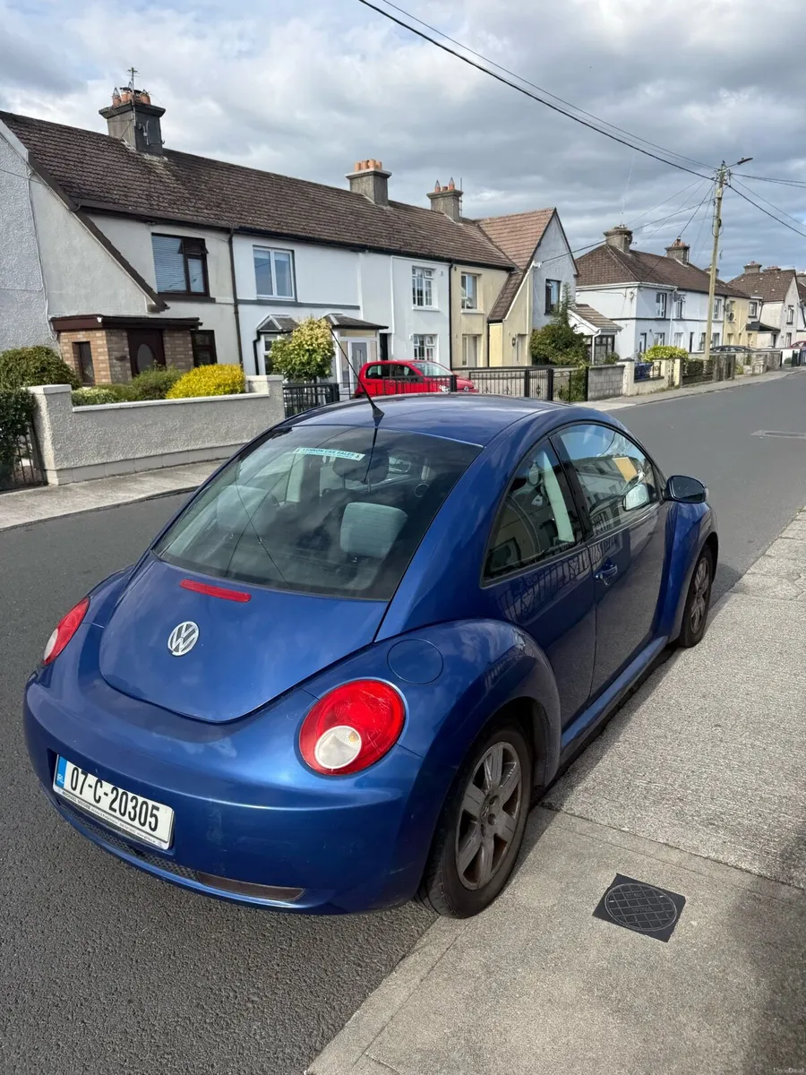 Blue Volkswagen Beetle - Image 4