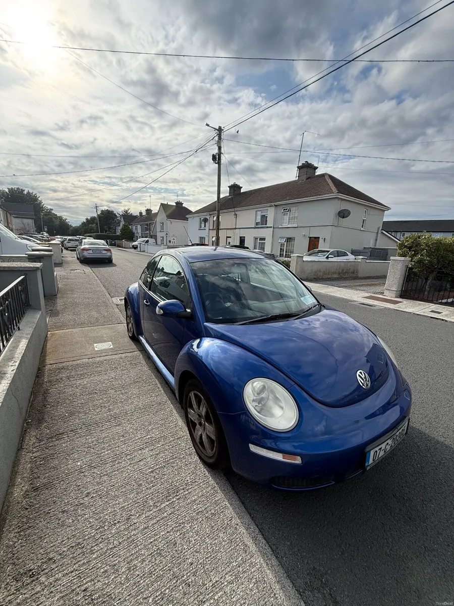 Blue Volkswagen Beetle - Image 1