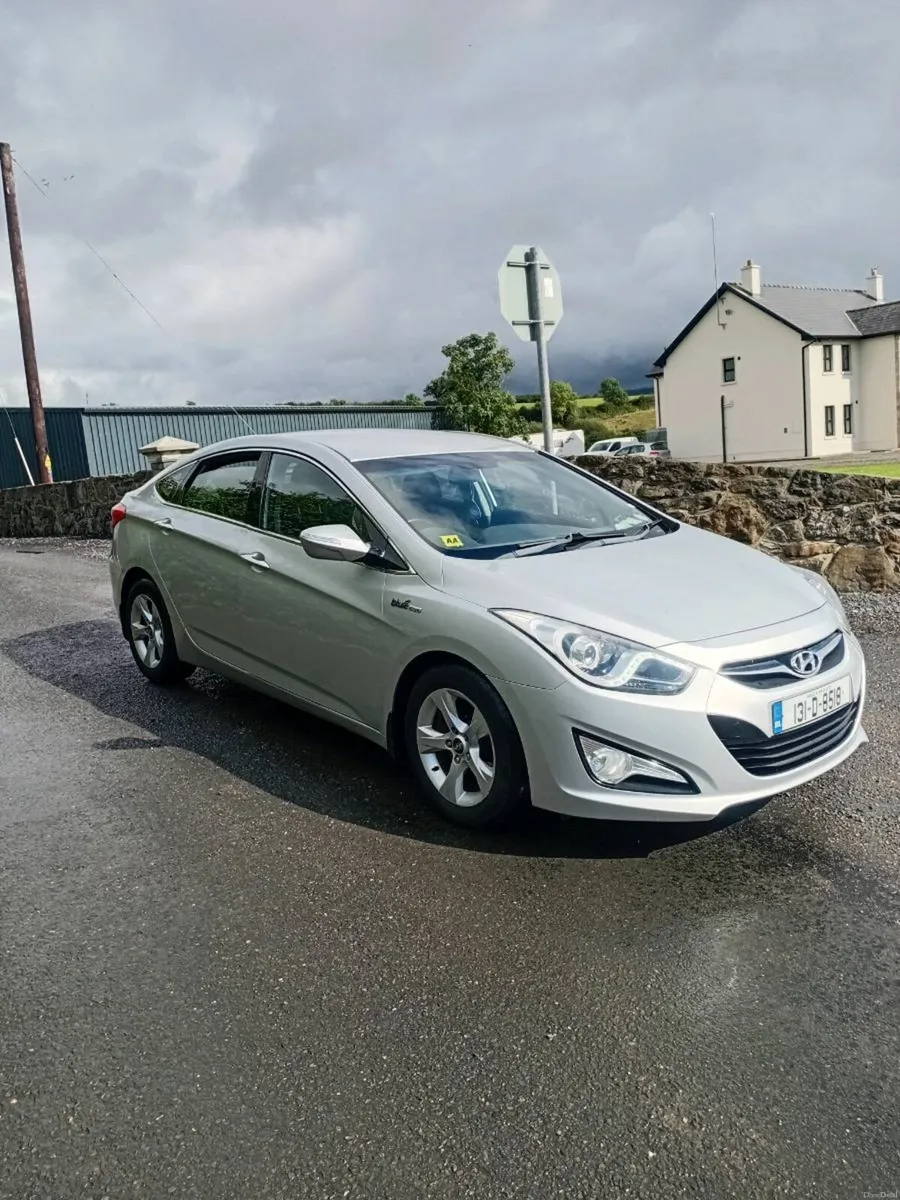 2013 hyundi 140 blue nct 06-27 - Image 1