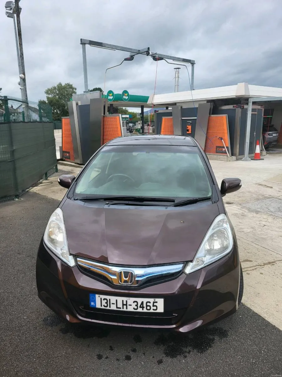 Honda Fit self charging hybrid low mileage - Image 1