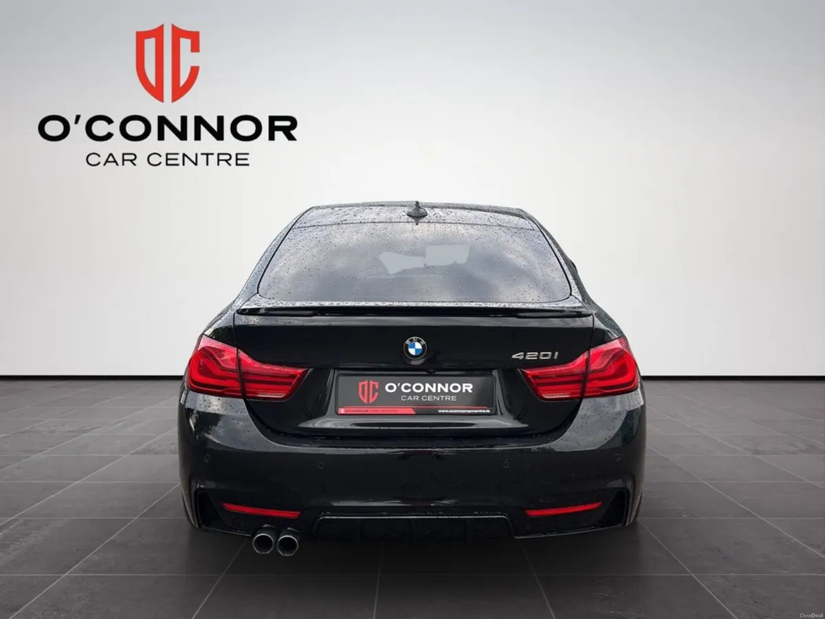 BMW 4-Series All black, all business. until you pu - Image 5