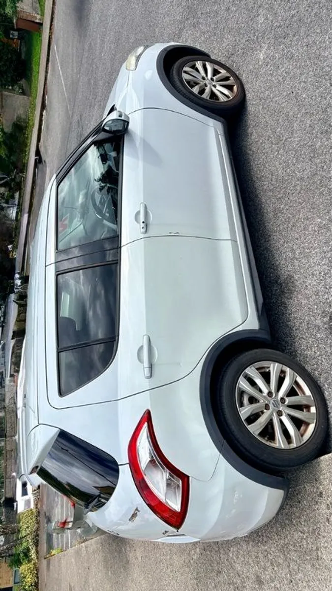 2015 Suzuki Swift - Image 1