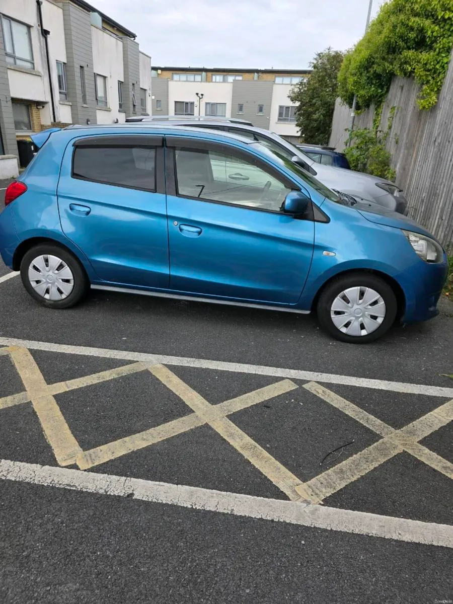 Automatic Mitsubishi mirage 2013
1.0L Petrol 
Mile - Image 1