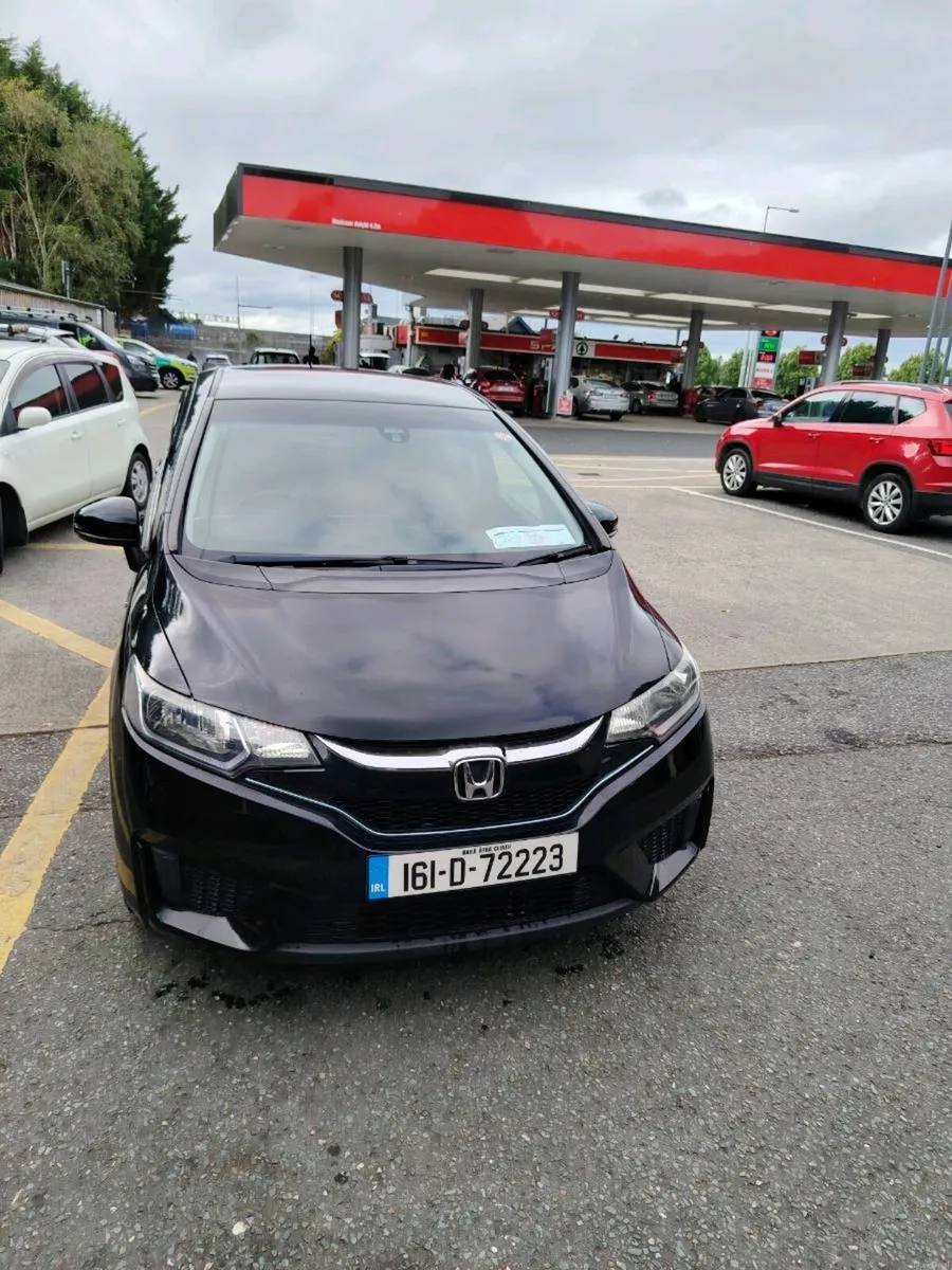 Honda fit hybird 2016 low mileage 76k - Image 1