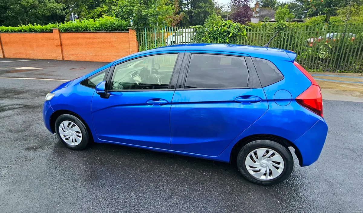 Honda Fit 2016 in great condition with NCT - Image 4