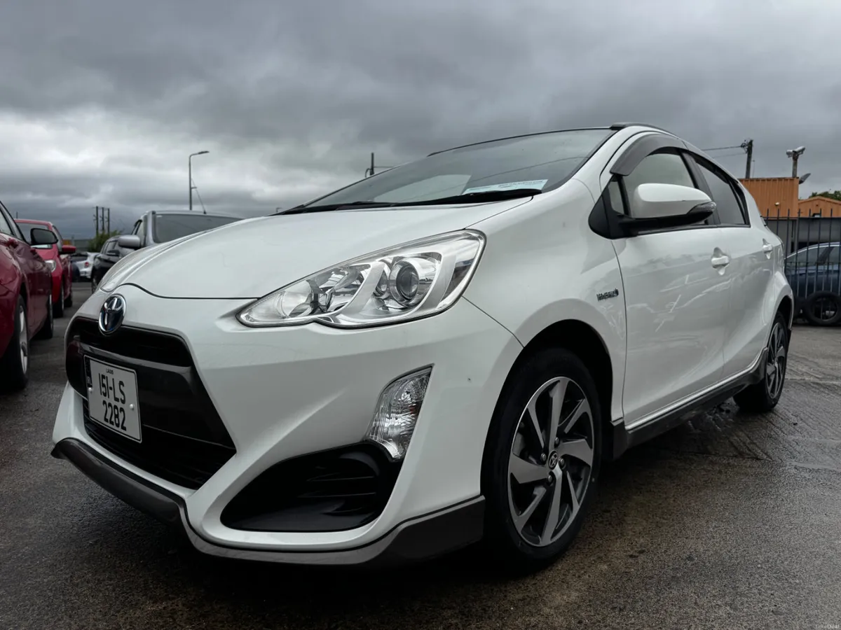 **Toyota Aqua 2015 Hybrid – Excellent Condition** - Image 1