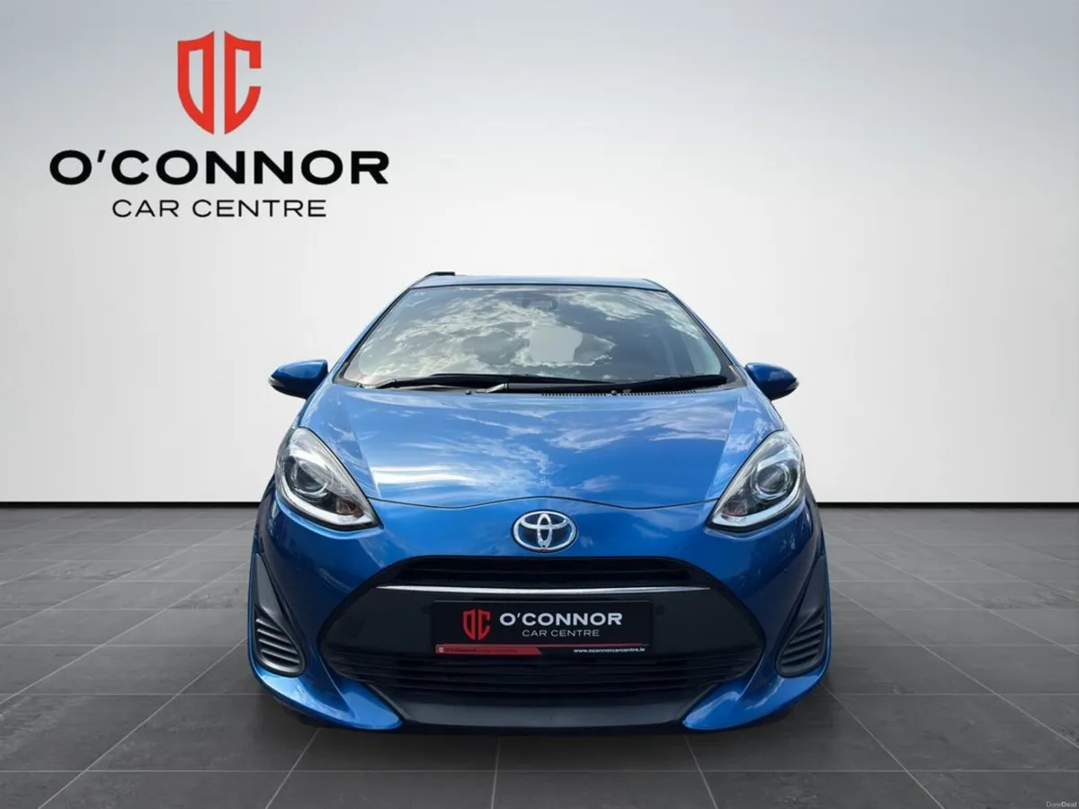 Toyota Aqua Blue on the outside, green at the pump - Image 2