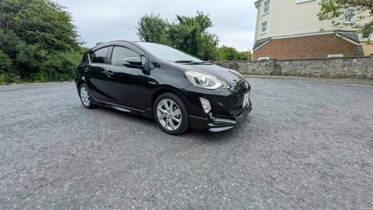 Toyota Aqua G Model 2015 automatic half leather - Image 1