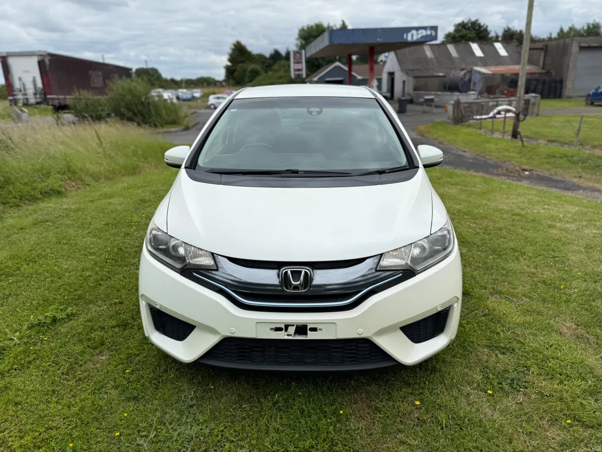 HONDA FIT (2014) 1.5L PETROL HYBRID VERY LOW MILEA - Image 1