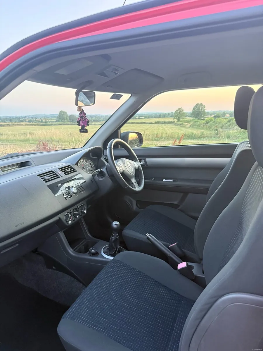 Red Suzuki Swift - Image 2