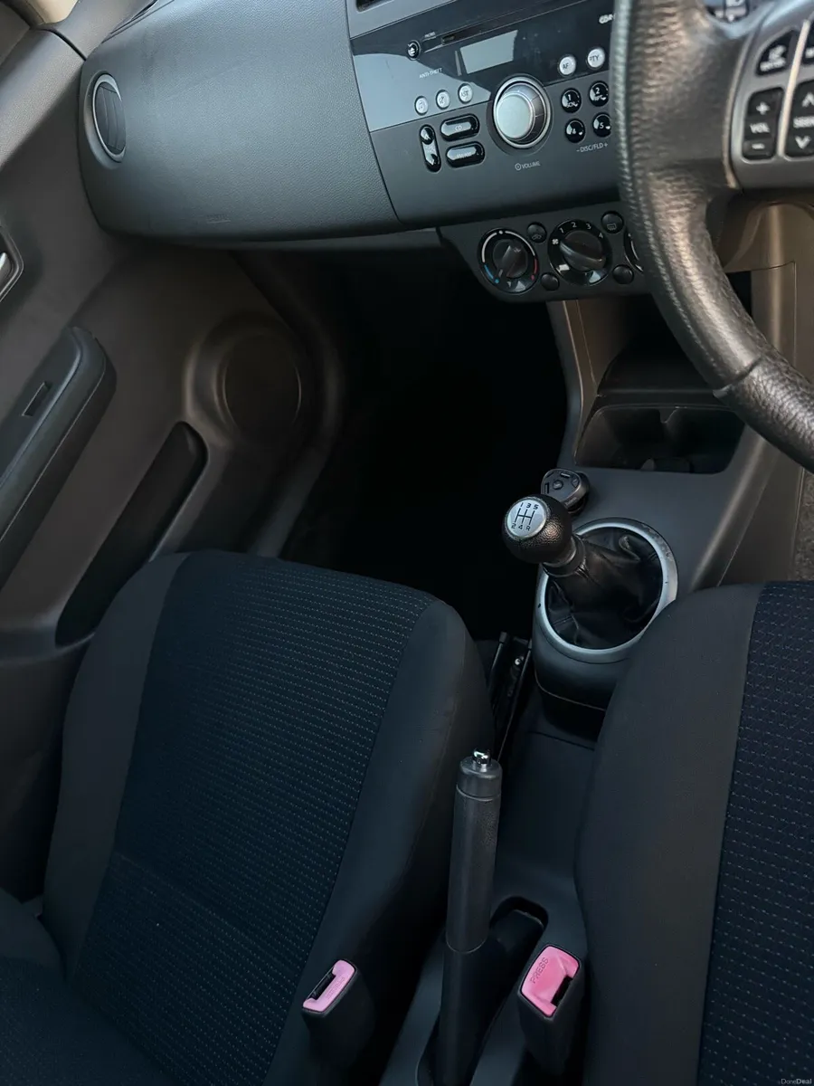 Red Suzuki Swift - Image 4