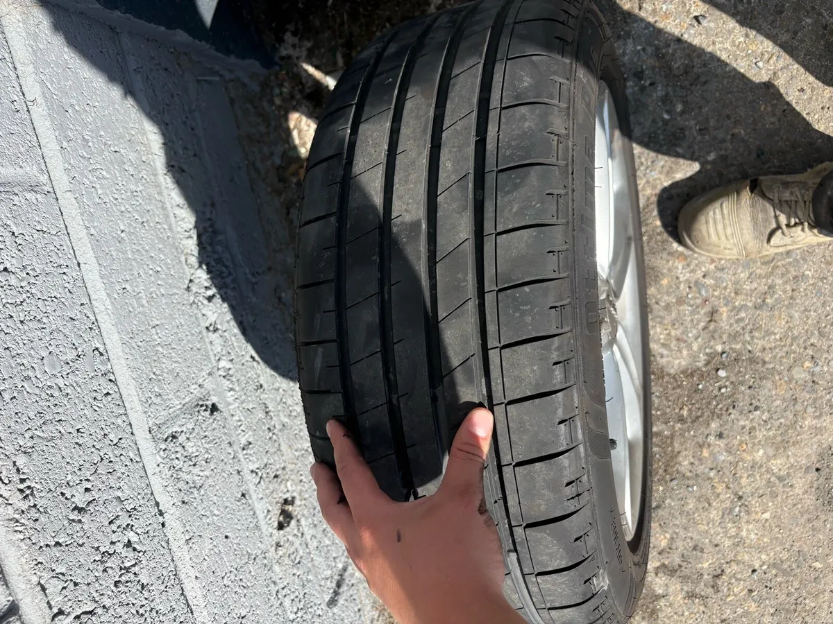 Original Audi A4 alloys with tyres - Image 1