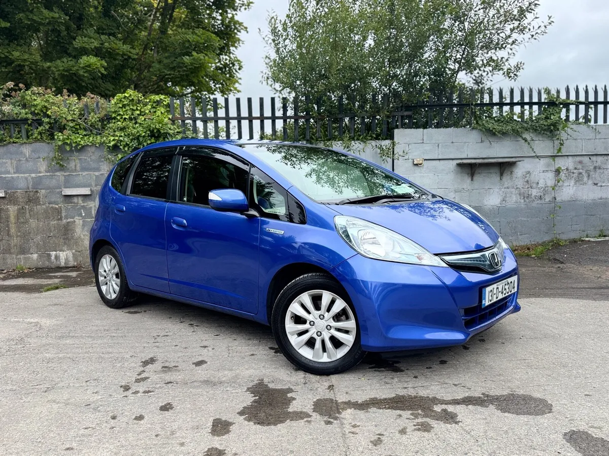 2013 HONDA FIT. NEW NCT & TAX. AUTO 1.3L HYBRID - Image 1
