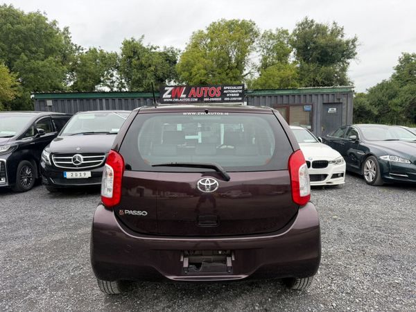 15 Toyota Passo 1.0 Auto 391540157