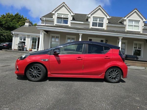 Toyota Aqua Hatchback, Petrol Hybrid, 2016, Red