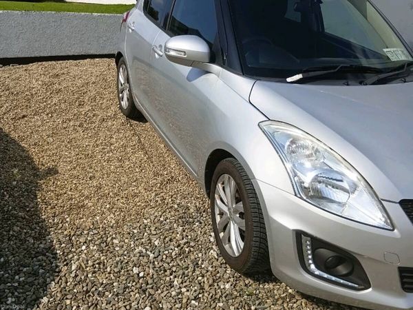 Suzuki Swift Hatchback, Petrol, 2015, Silver