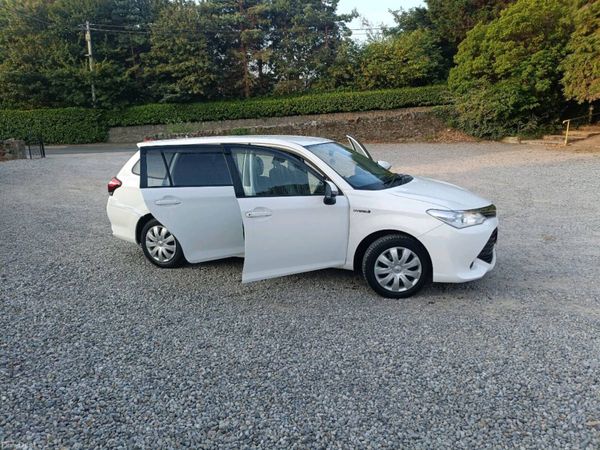 Toyota Corolla Estate, Petrol Hybrid, 2016, White