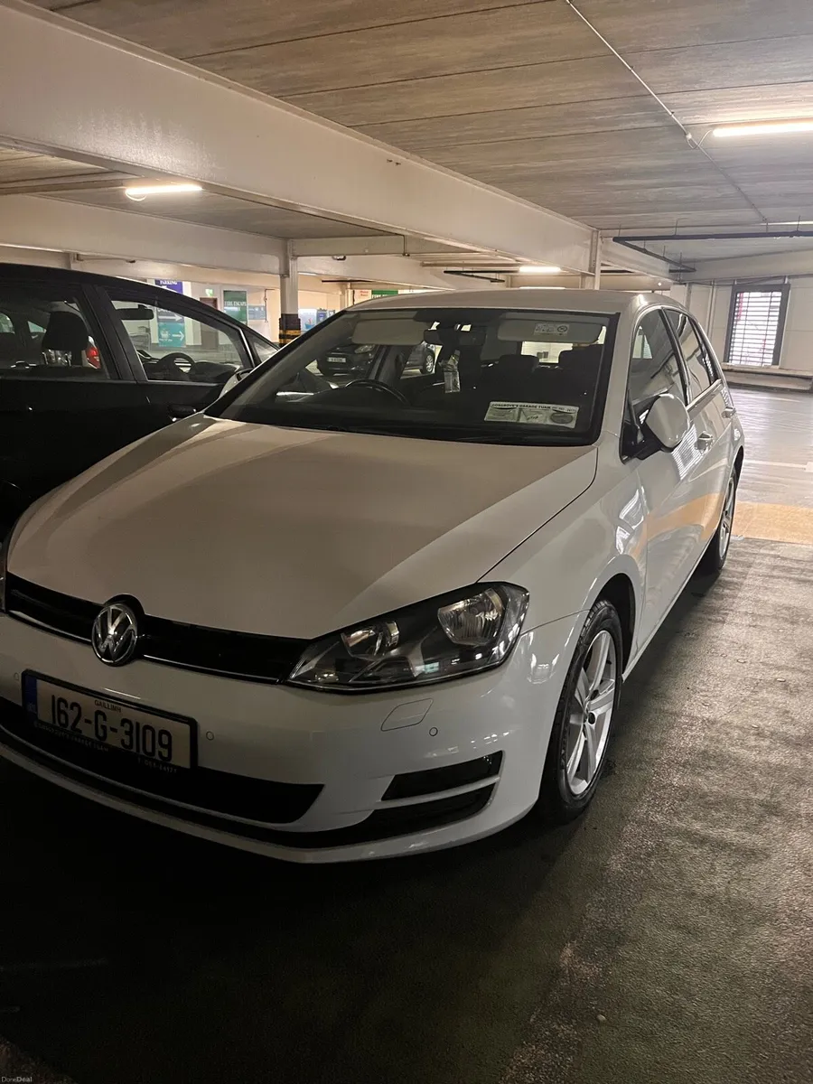 White Volkswagen Golf - Image 1
