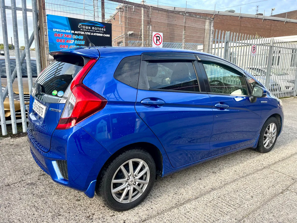 Honda Fit 2015 hybrid  half leather - Image 4