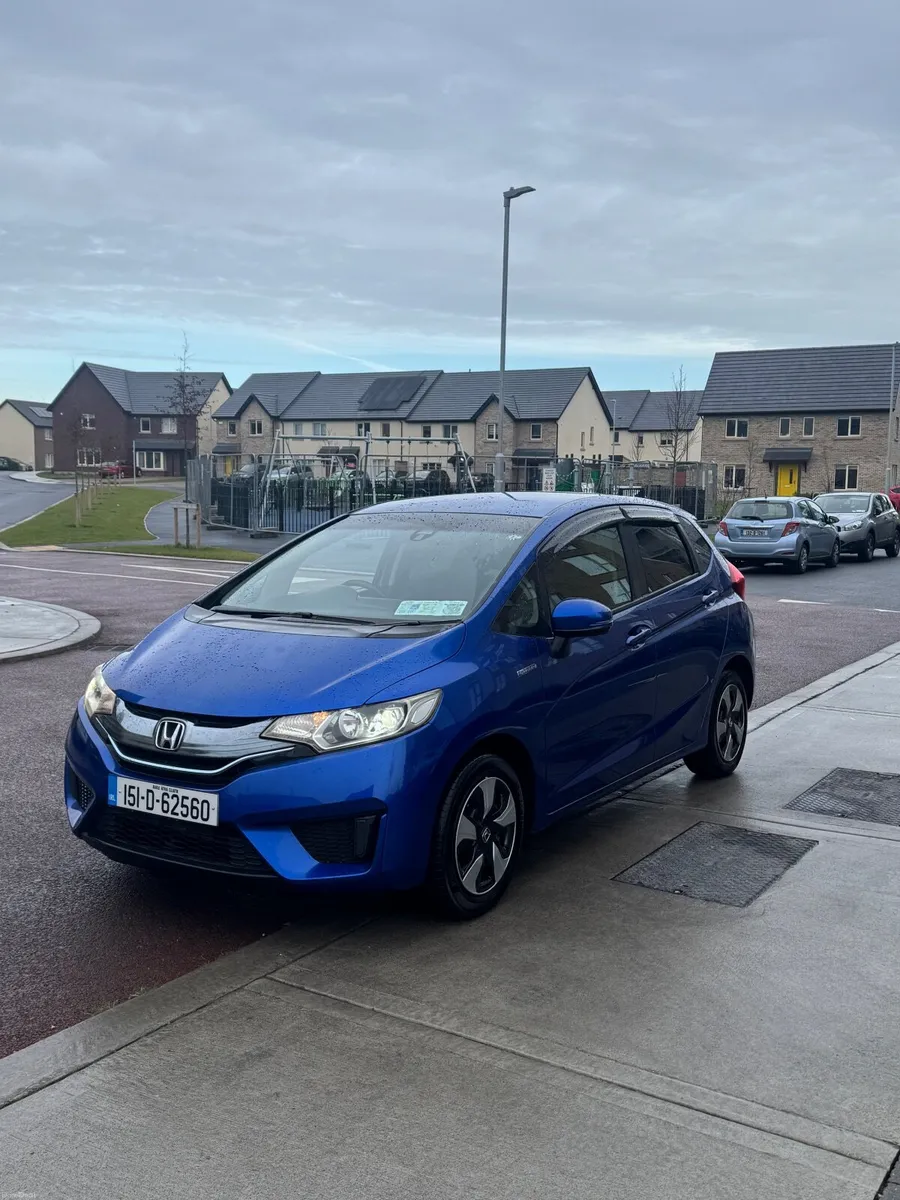 2015 Honda Fit Nicen Blue Hybrid 1 Owner - Image 1