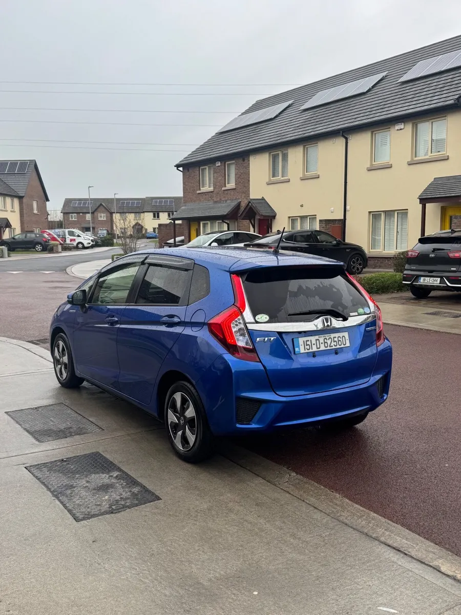 2015 Honda Fit Nicen Blue Hybrid 1 Owner - Image 2