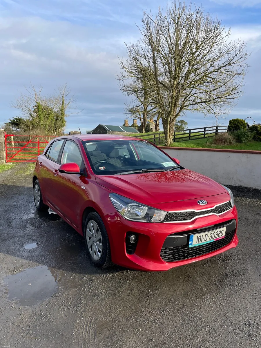181 Red Kia Rio - Image 1