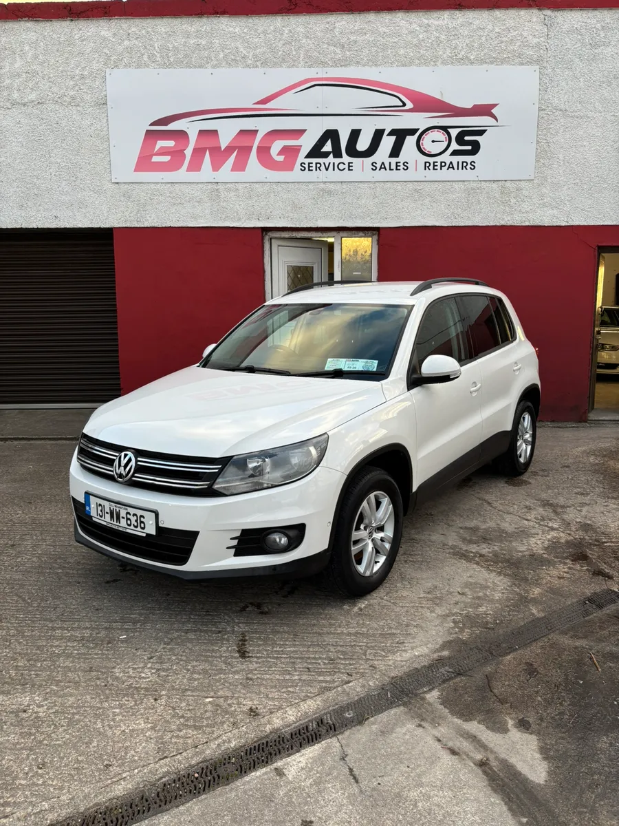 2013 VOLKSWAGEN TIGUAN DELIVERY WARRANTY - Image 1