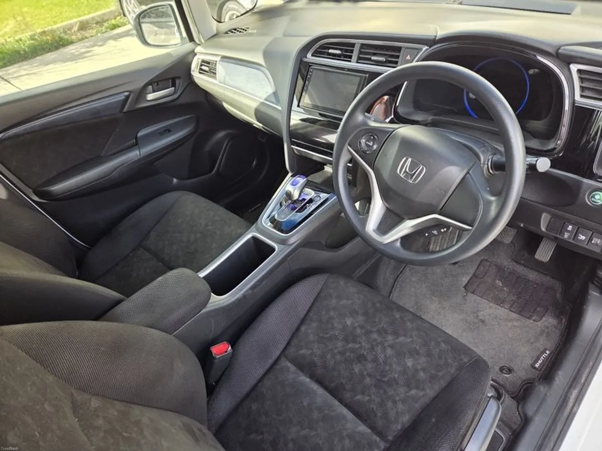 2015 Honda Shuttle - Image 2