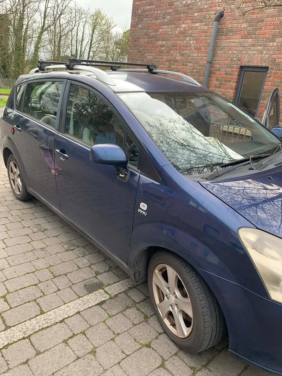 Toyota Corolla blue 2004 7 seater - Image 2
