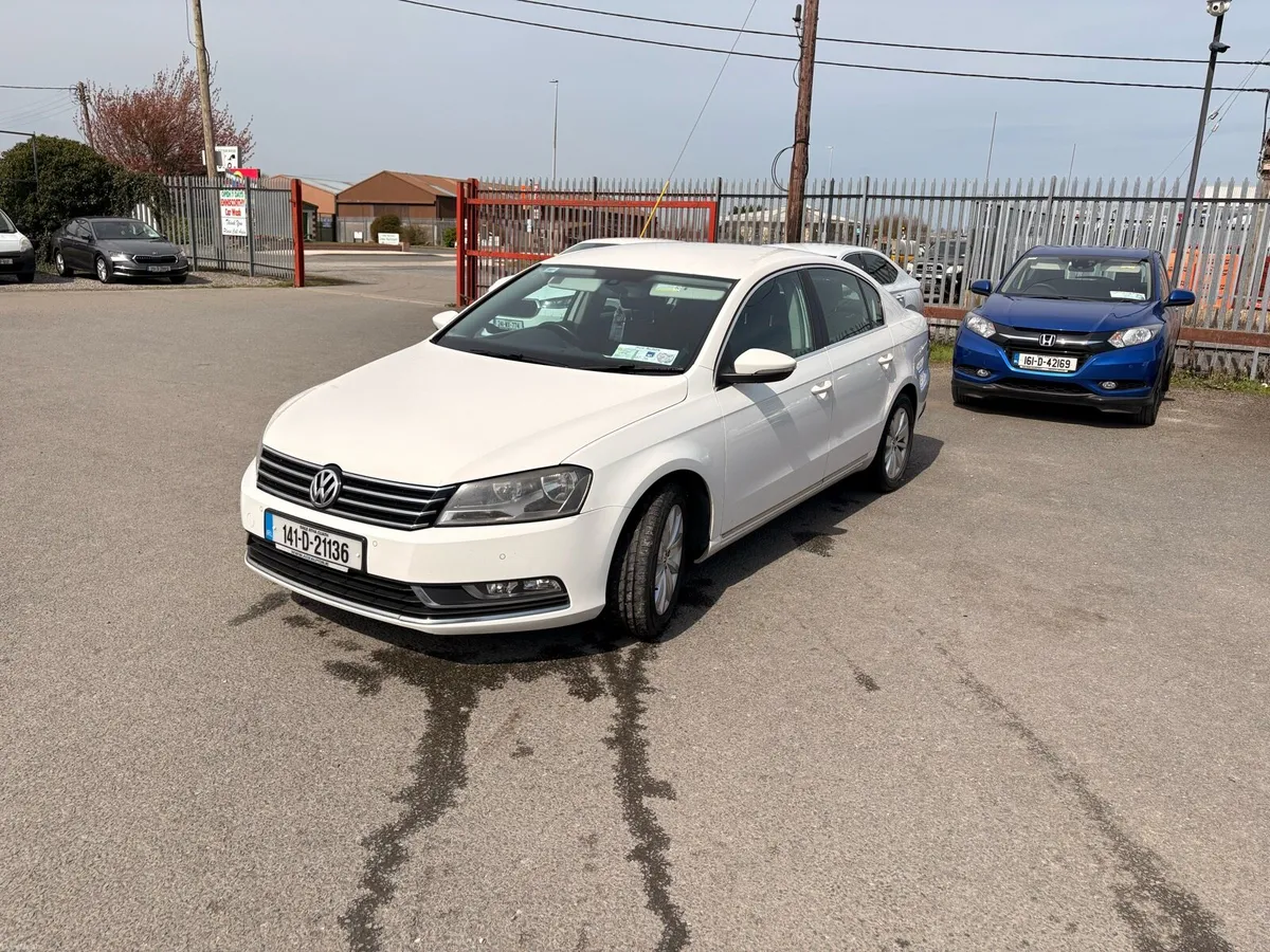 White Volkswagen Passat 1.6 TDI - Image 1