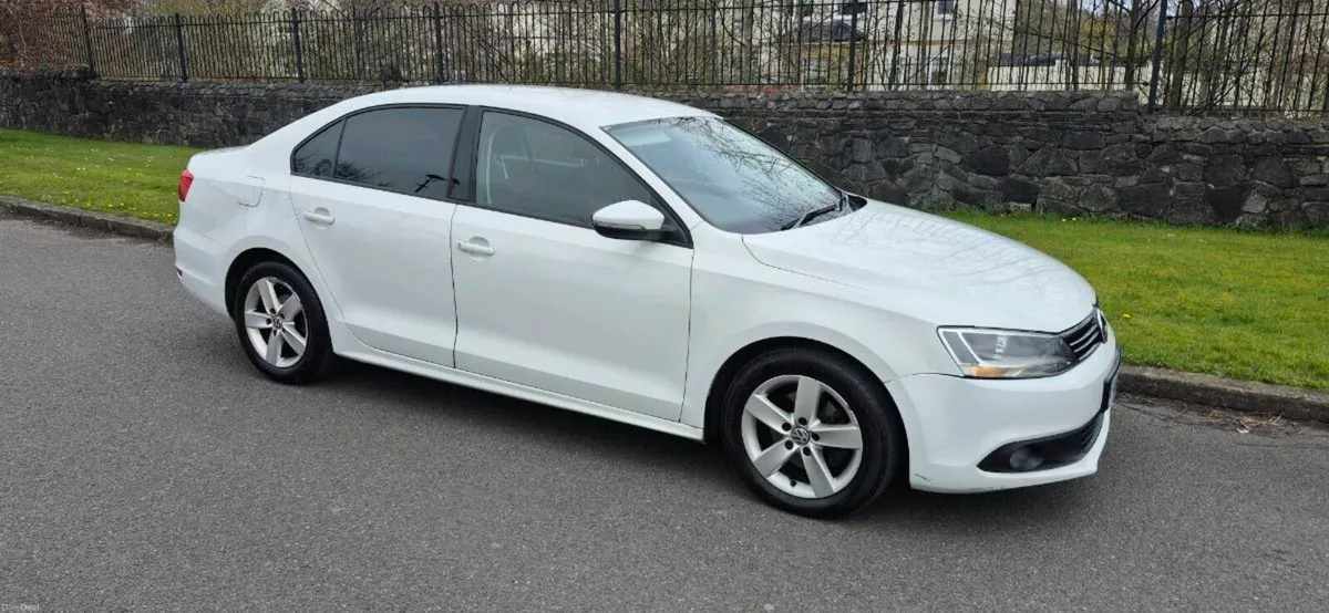 2014 volkswagon jetta lowest mileage youll find. - Image 1