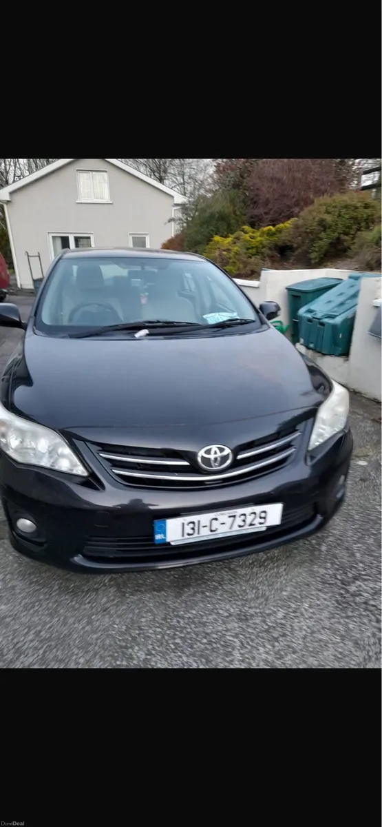 Toyota Corolla Black Saloon - Image 1