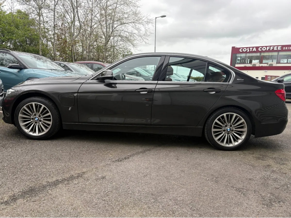 BMW 3-Series 2.0 PETROL HYBRID 330E LUXURY - Image 4