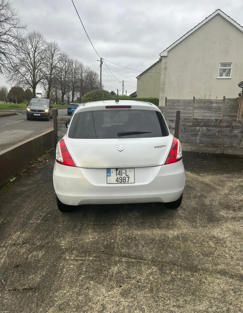 2014 model Automatic Petrol Suzuki Swift - Image 2