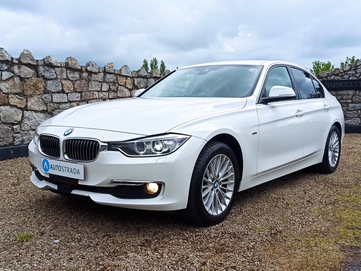 151 BMW 320d luxury • Black Leather - Image 3
