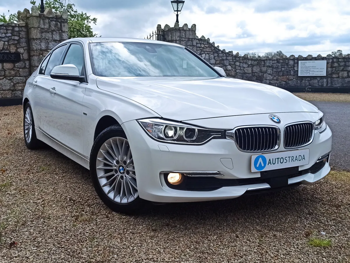 151 BMW 320d luxury • Black Leather - Image 1