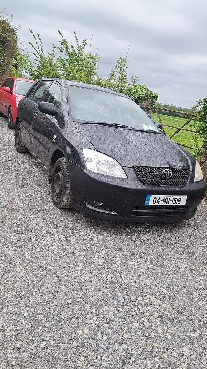 04 E12 Toyota Corolla - Image 1
