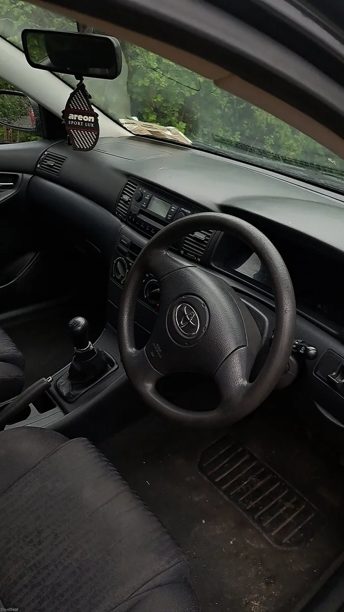 04 E12 Toyota Corolla - Image 4