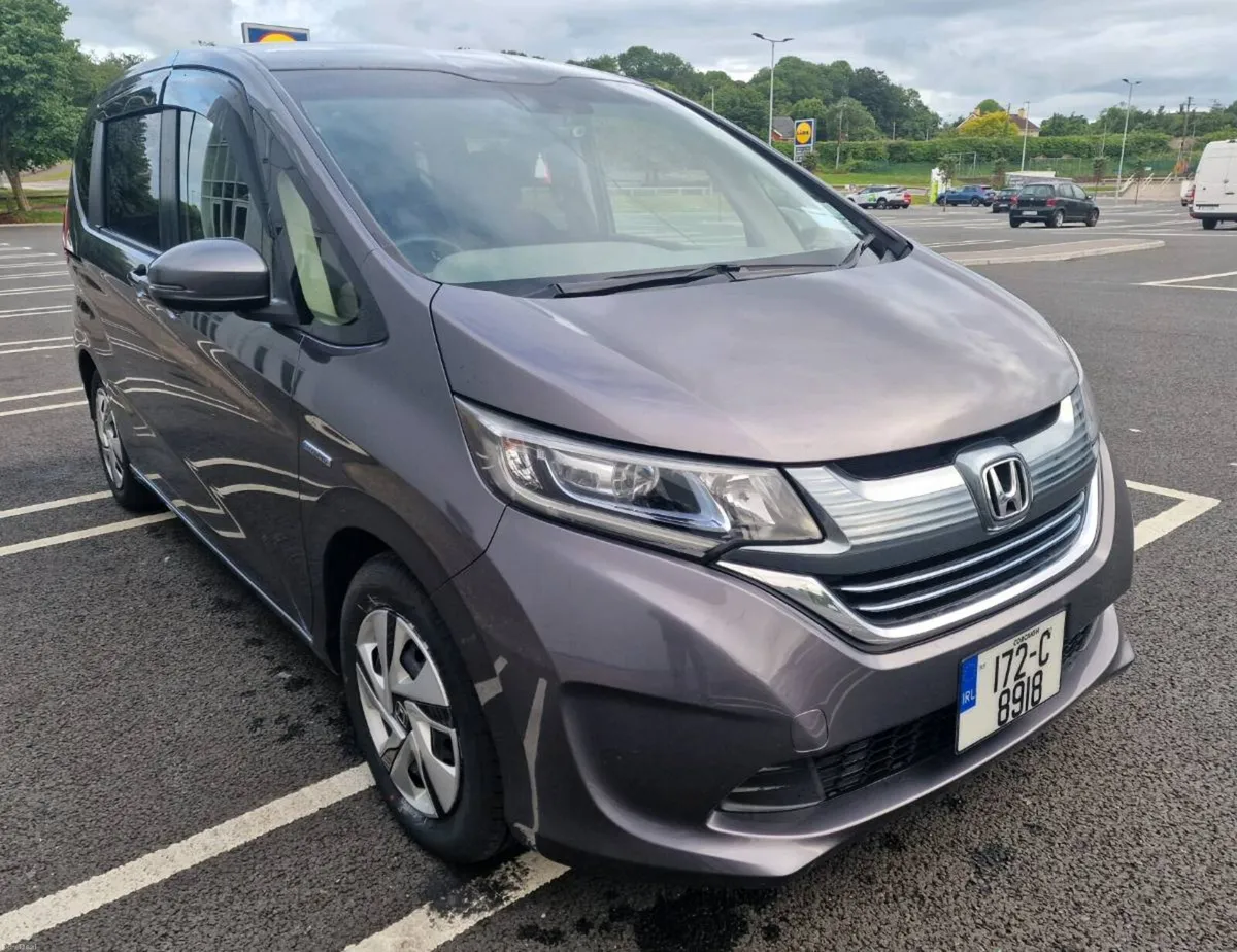 2017 Honda Freed  1.5L  Hybrid 6 seats. GRAY - Image 1