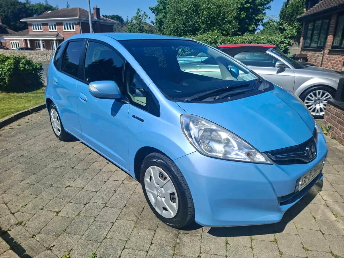 HODA FIT 1.3 HYBRID AUTOMATIC 2013 TOTALLY  MINT - Image 1