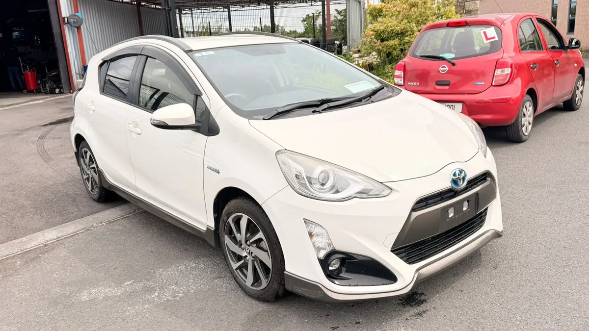 Toyota Aqua White (URBAN) - Image 1
