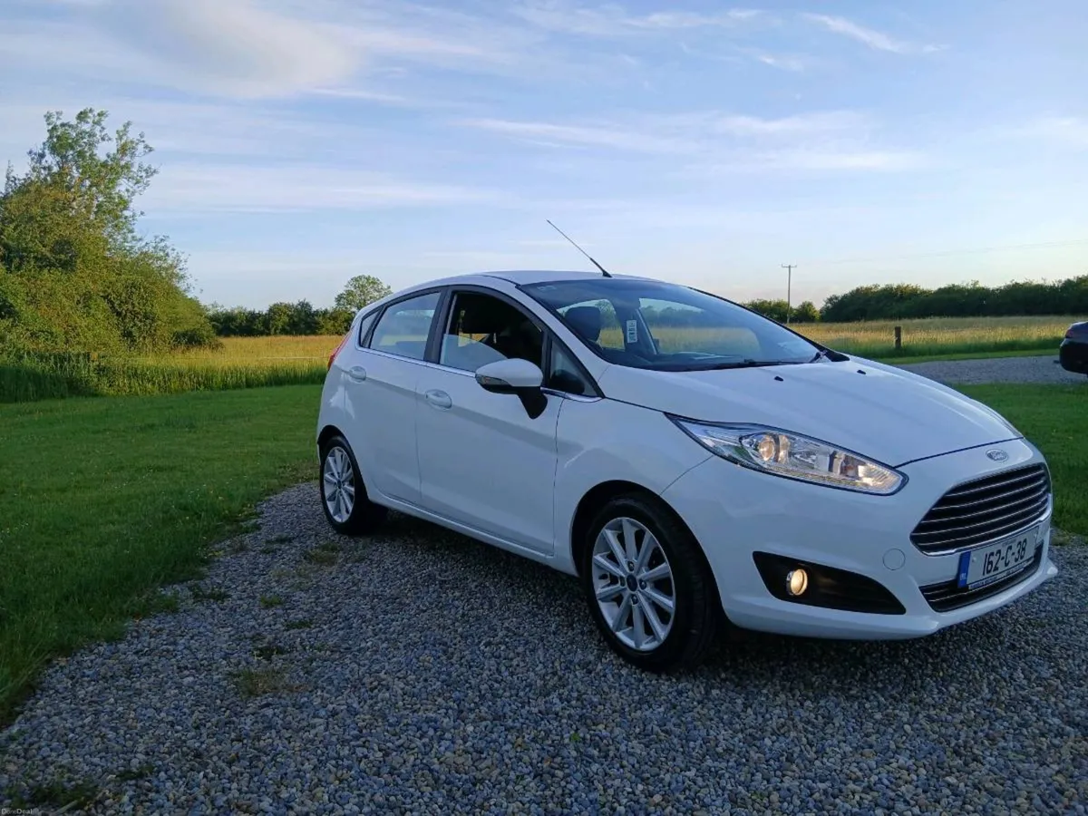 FORD FIESTA TITANIUM 1.25 PETROL LOW MILEAGE - Image 1