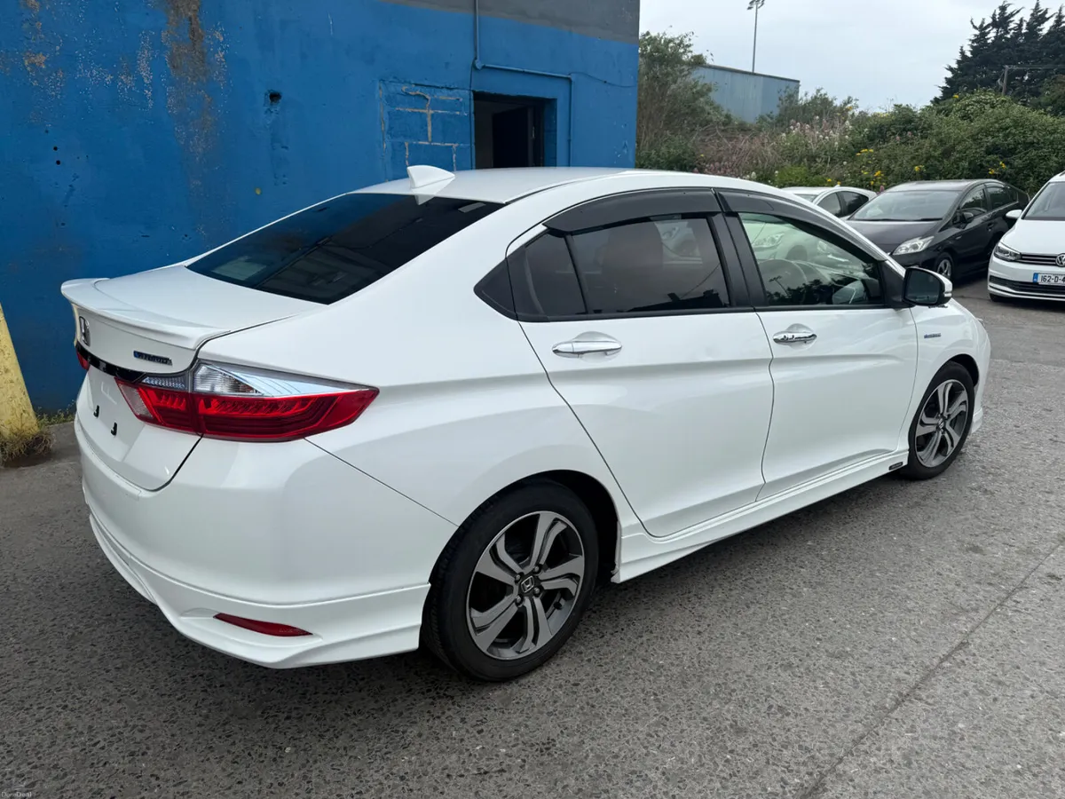 2015 Honda Fit Hybrid Automatic/ G leather spec - Image 4