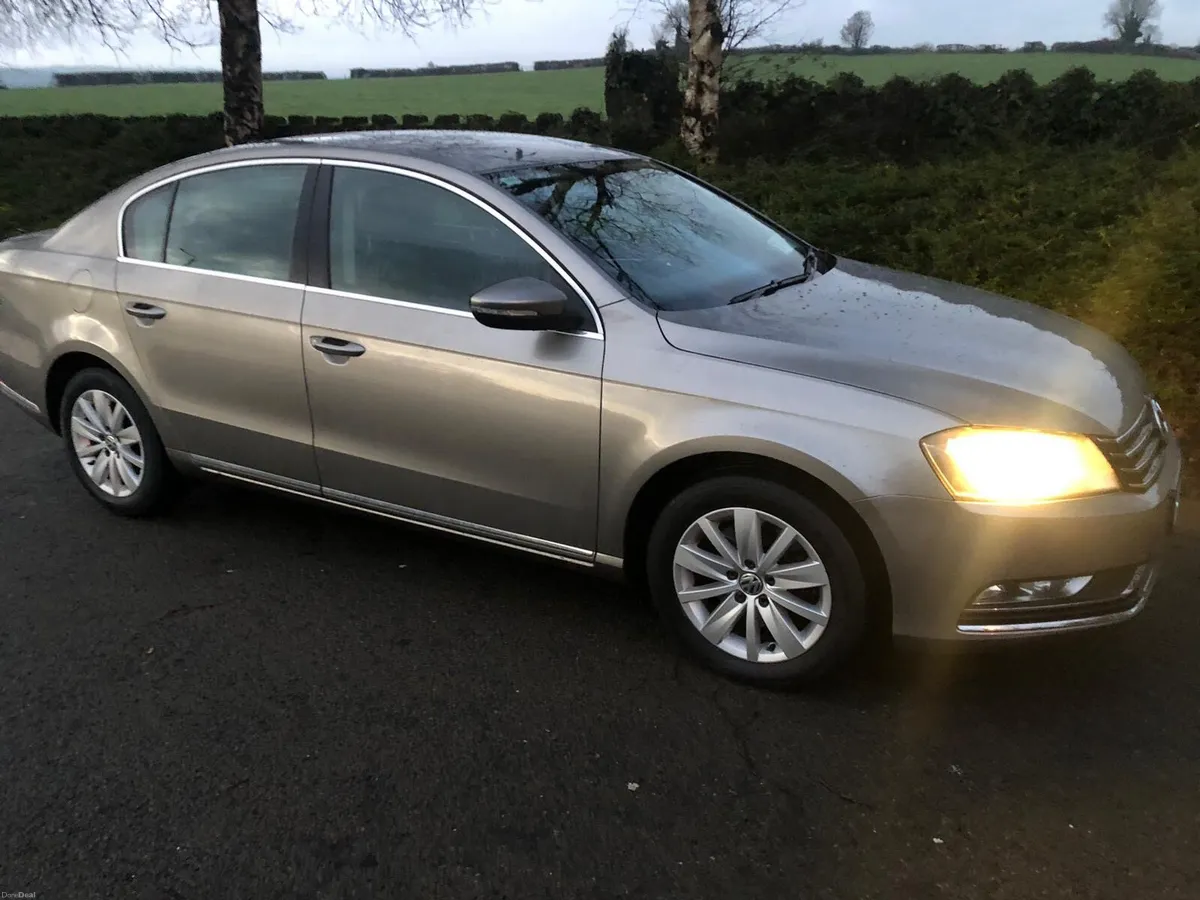 VW PASSAT TDI BLUE MUTATION AS NEW - Image 1