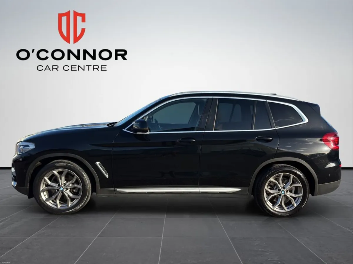 BMW X3 Black on the outside, tan on the inside… th - Image 2