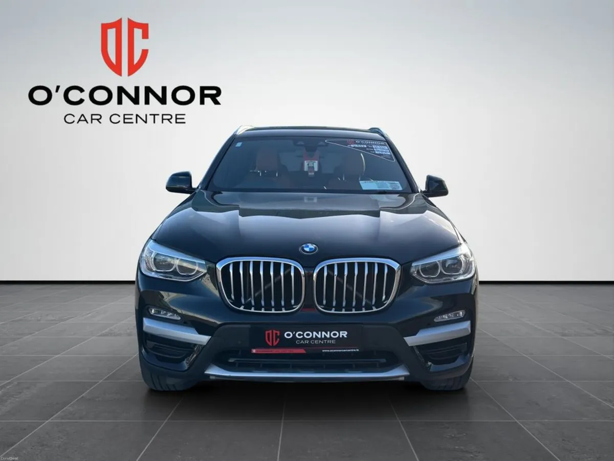 BMW X3 Black on the outside, tan on the inside… th - Image 4